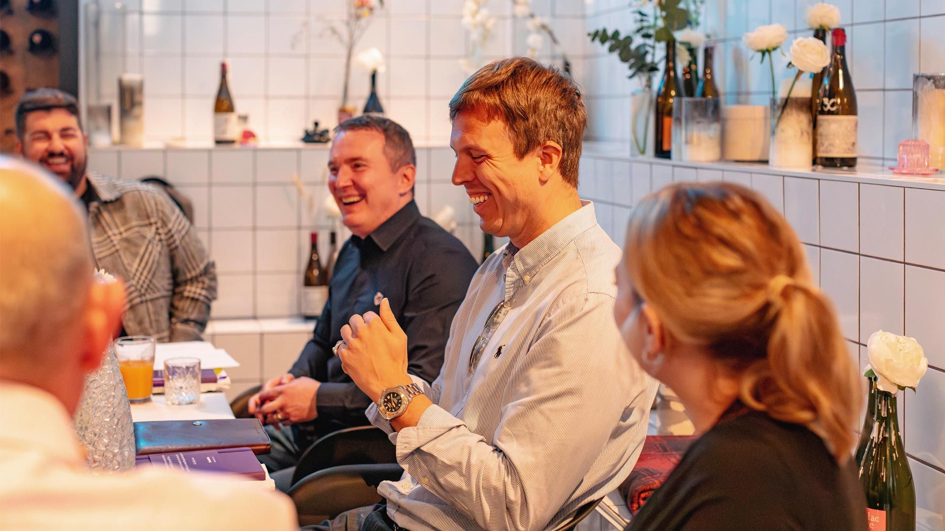 People laughing at breakthrough breakfast