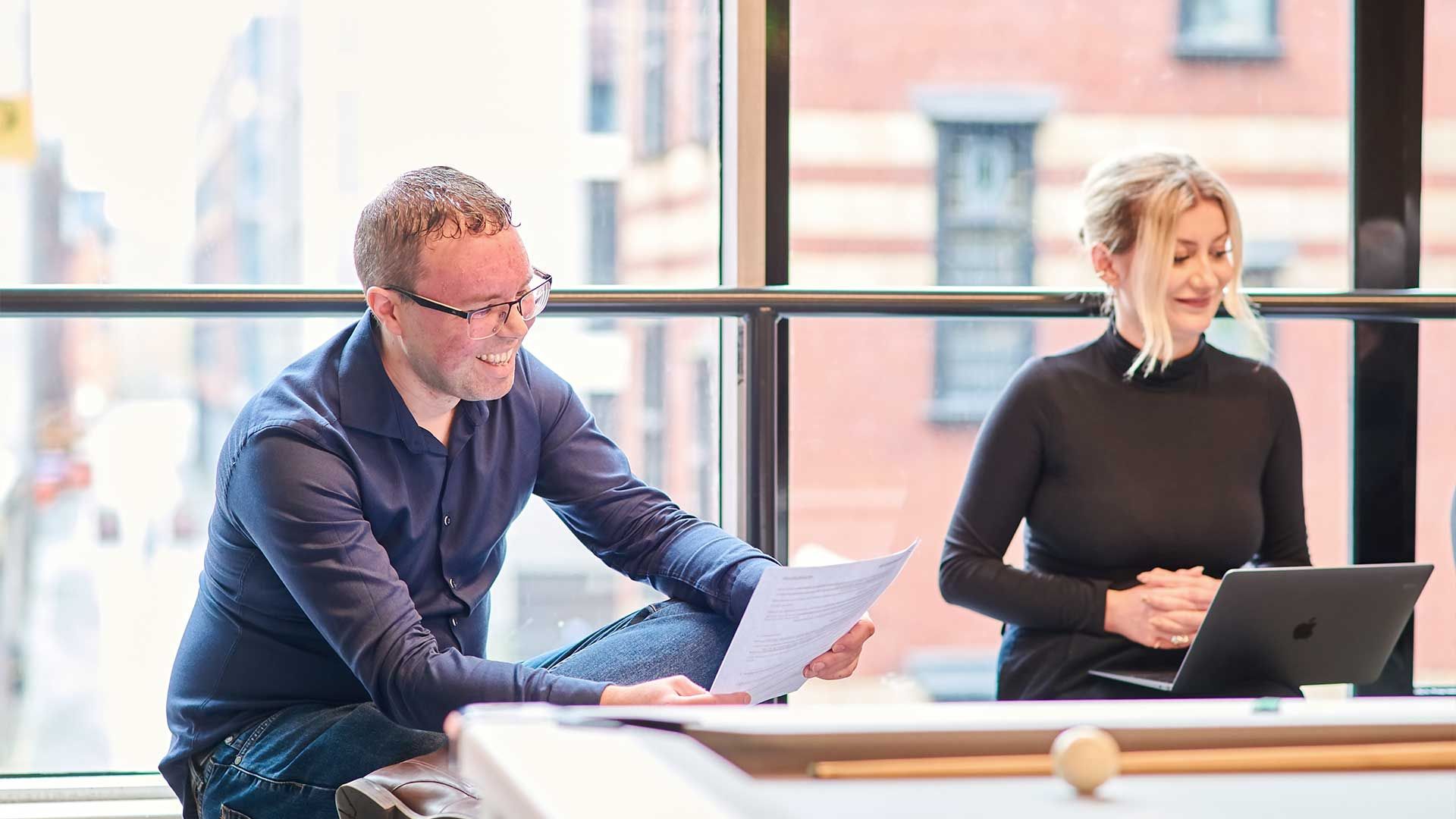 Studio North colleagues laughing