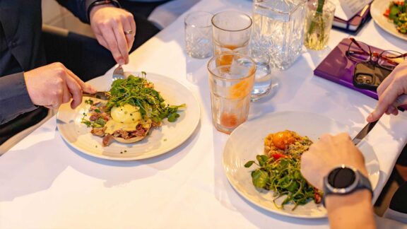 people eating at breakthrough breakfast meeting